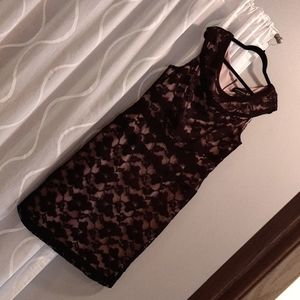 Black over nude cocktail dress